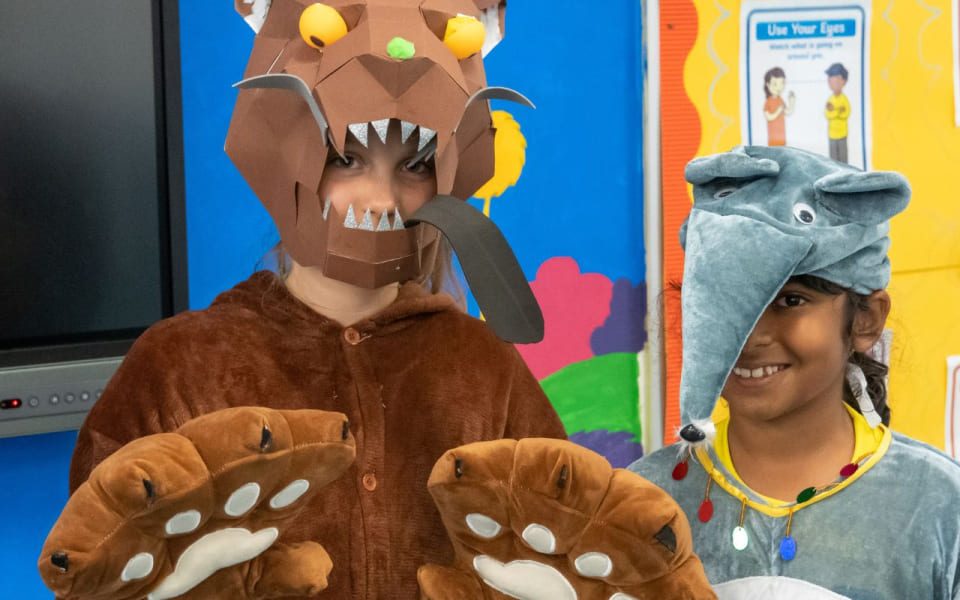 Primary School students dressed up in gruffalo drama performance