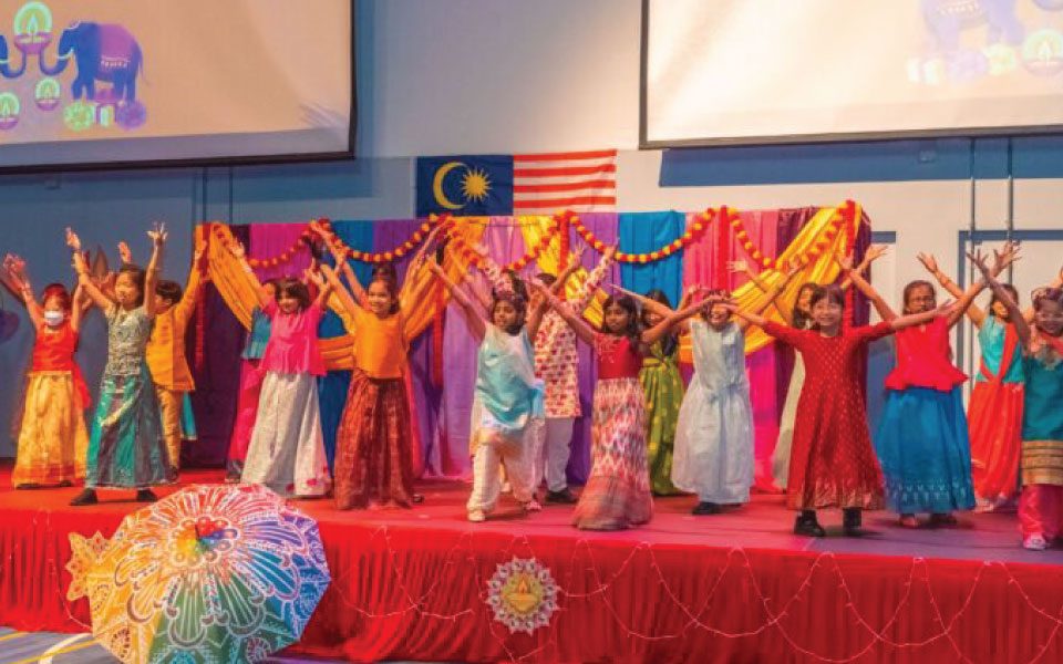 Sri KDU Subang Jaya Primary School students in colourful sari dancing during Deepavali Assembly